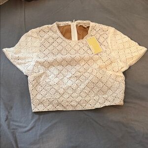 Michael Kors Geo Eyelet White Cropped Short Sleeved Top. NWT